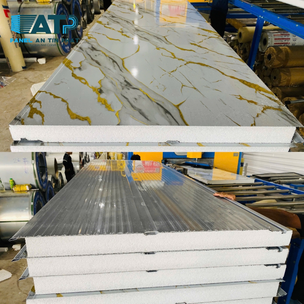 Cận cảnh tấm panel EPS cách nhiệt vân đá cẩm thạch trắng và nguyên tố trắng tại xưởng sản xuất An Tín Phát.